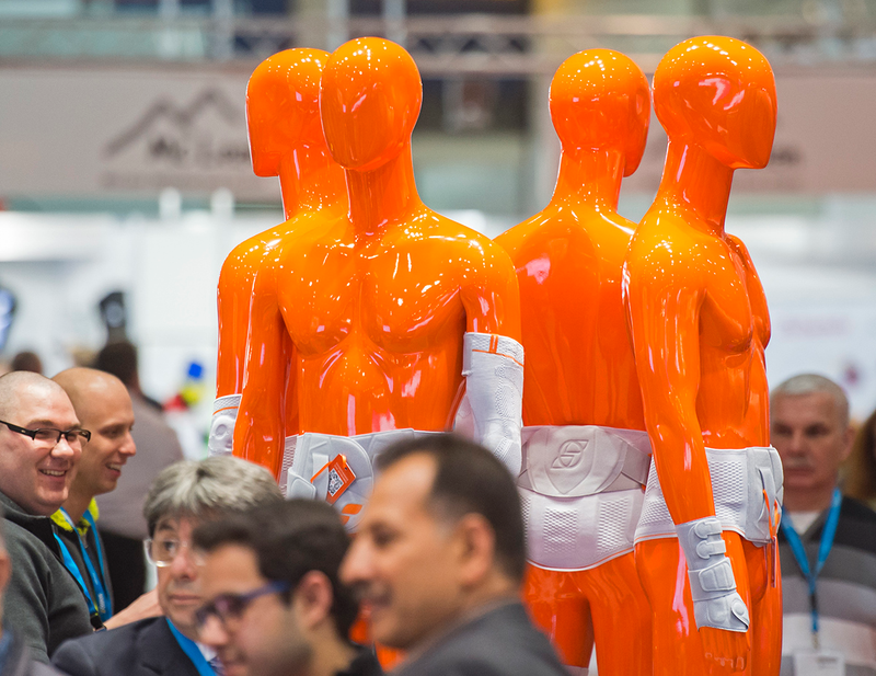 A group of monequins show off next generation braces from Sporlastic Orthopaedics. Image: Jens Meyer/AP